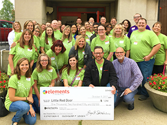 Elements employees volunteer at Little Red Door