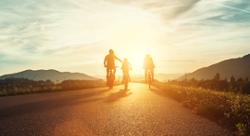 Photo of family bike riding.