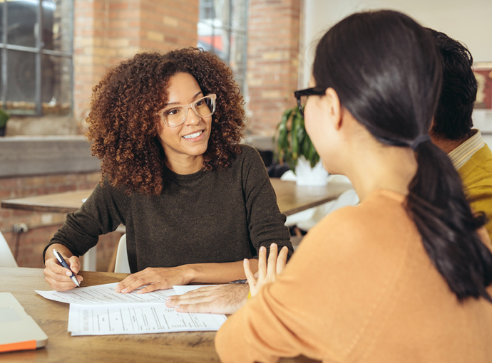 Employee helping couple with finances