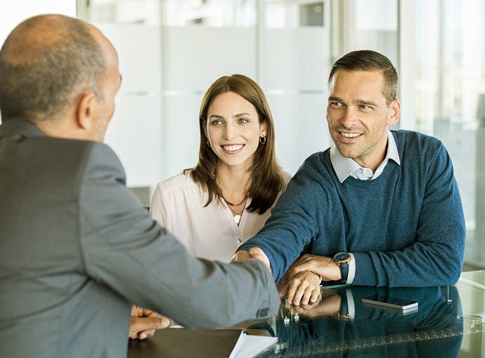 Couple meeting with loan officer