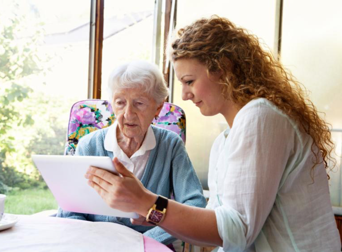 Daughter assisting mother