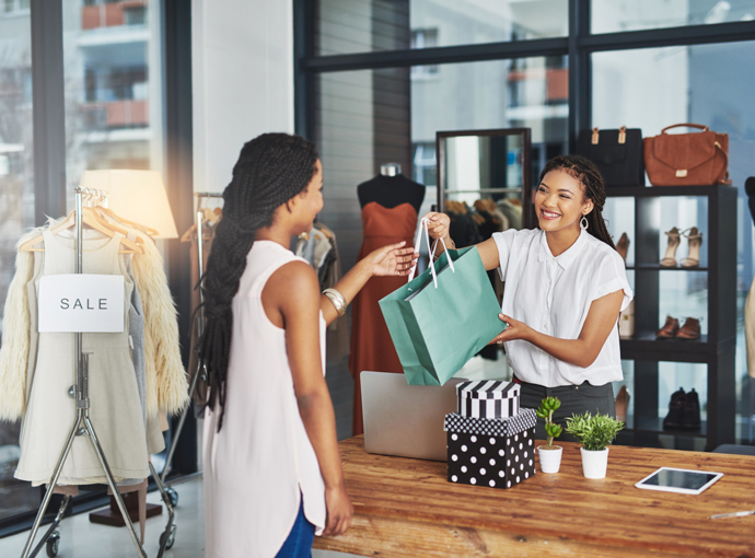 People shopping at a counter