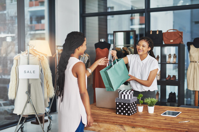 People shopping at a counter