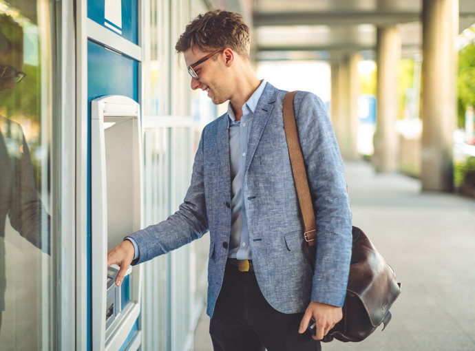 A young professional hitting the ATM