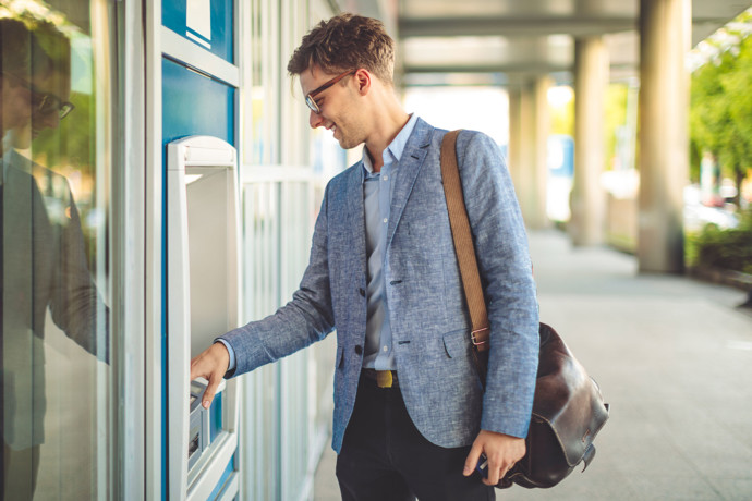 A millennial hitting the ATM