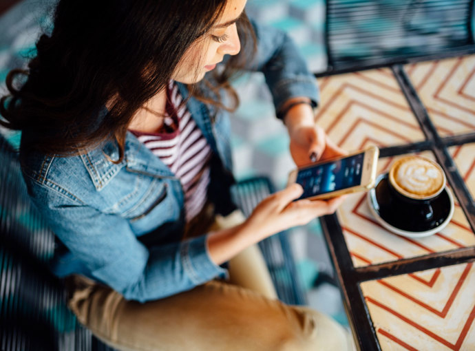 A woman enjoying some coffee