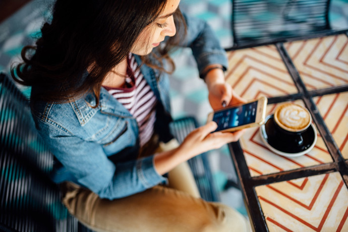 A woman enjoying some coffee