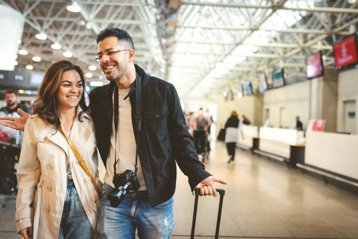 Couple at an airport.