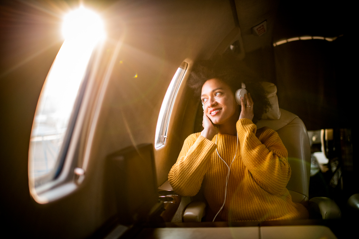 Woman on an airplane.