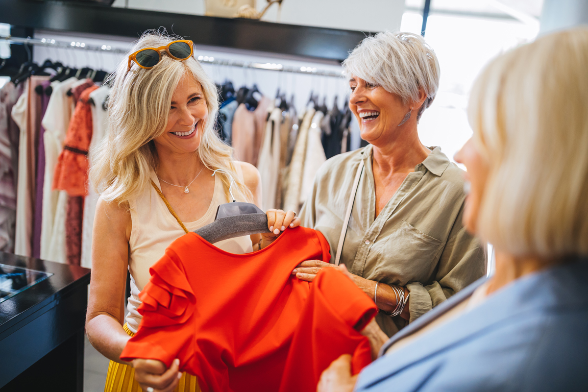 Friends shopping for a dress.