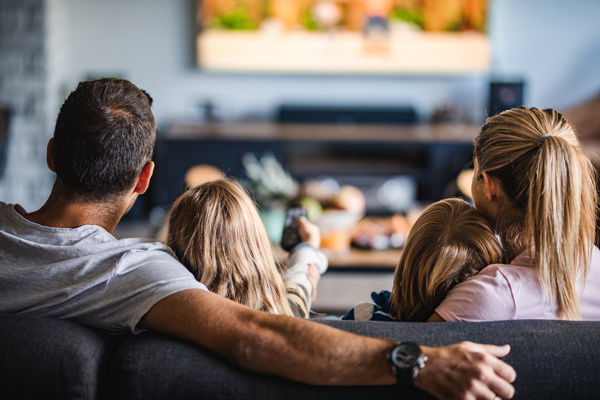 Family enjoying television