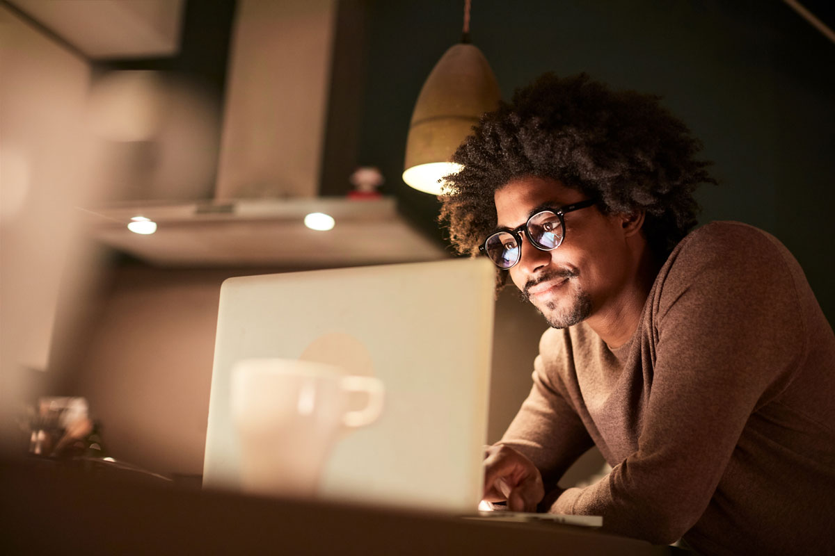 Man working on his finances on his laptop.