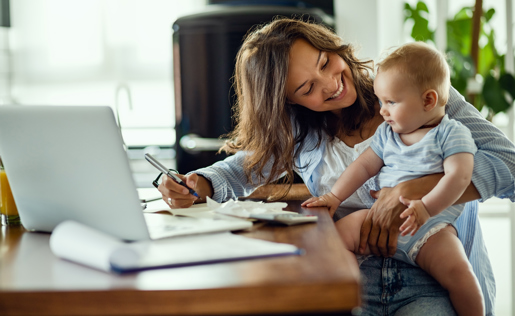 Mother and baby paying bills.