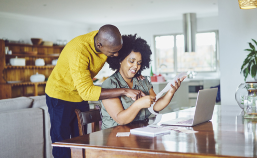 Couple looking at financial papers