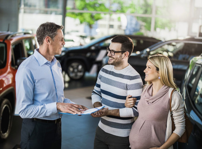 Couple buying a car