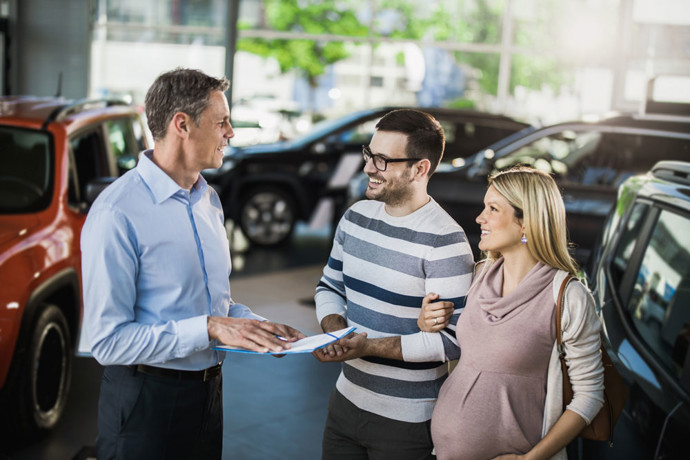 Couple buying a car