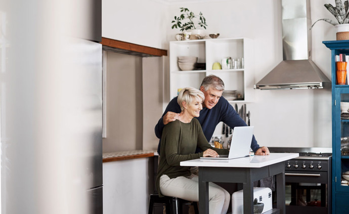 Couple looking over their finances.