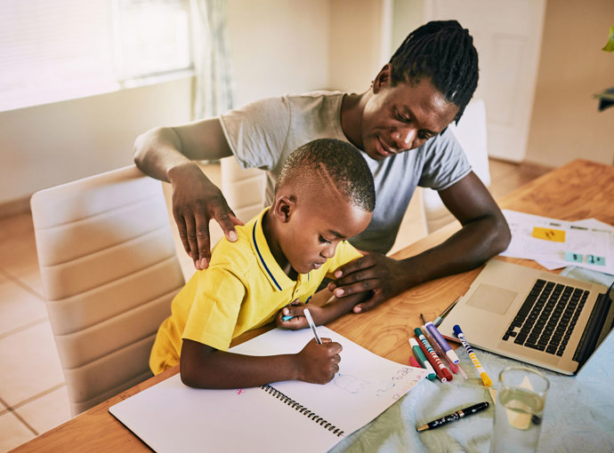 Mom and child doing homework.