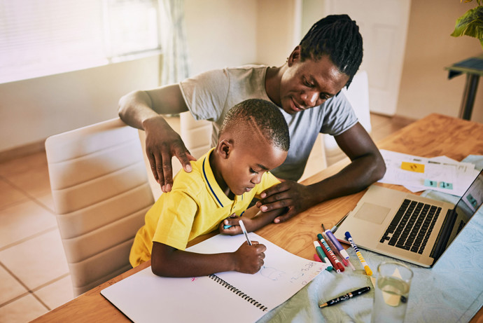 Mom and child doing homework.