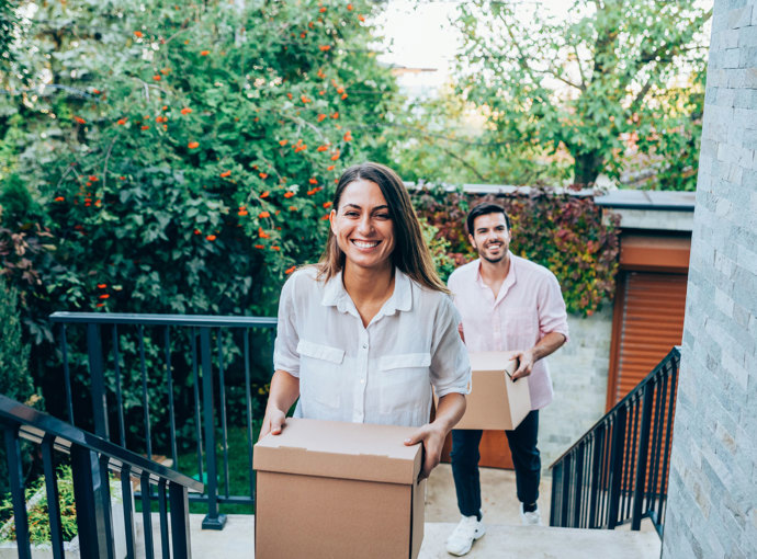 Couple moving into their first home.