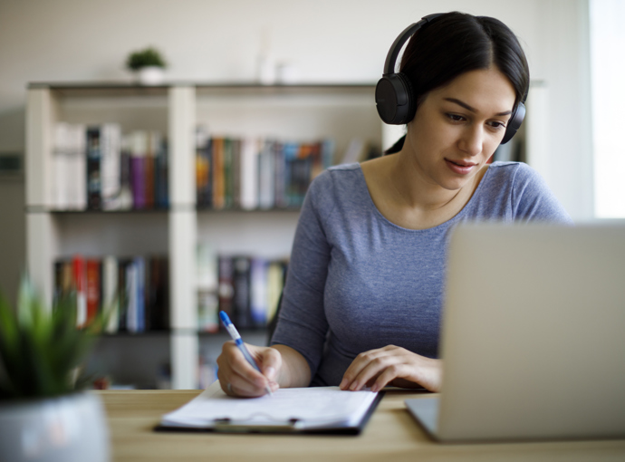 Woman reviewing finances with Elements