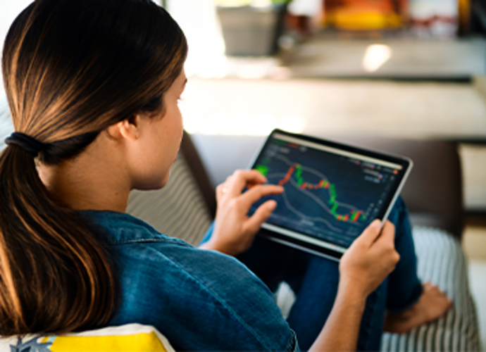 Woman looking at investing charts