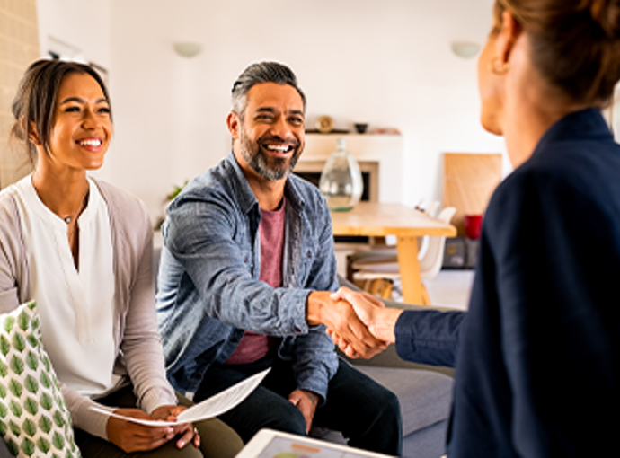 A couple talking to their new financial advisor