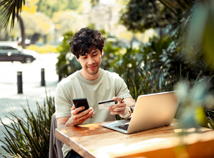 Man making payment for his credit card on his phone