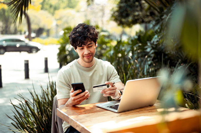 Man making payment for his credit card on his phone