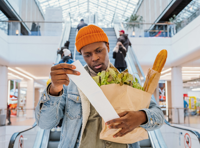 Looking at receipt after shopping